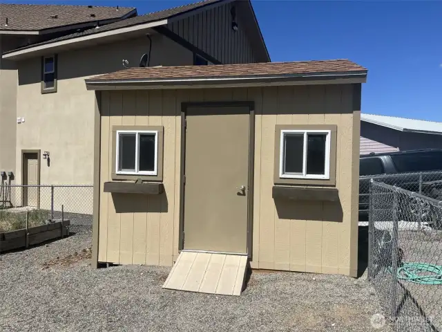 New custom built shed with built in bunks.