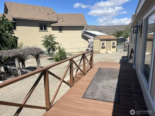 Side deck of the house over looking the yard.