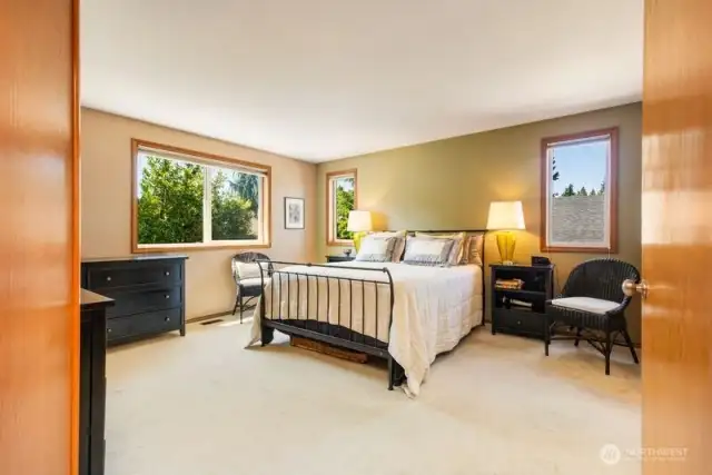 Large primary with walk-in closet and updated  en-suite.