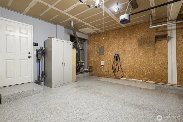 Garage with epoxy floor covering and EV charger