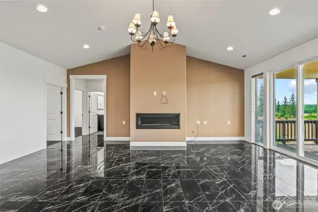 Living room with gas fireplace.