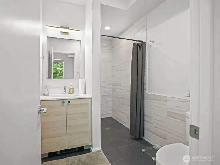 3/4 bath with striking tile & curbless shower