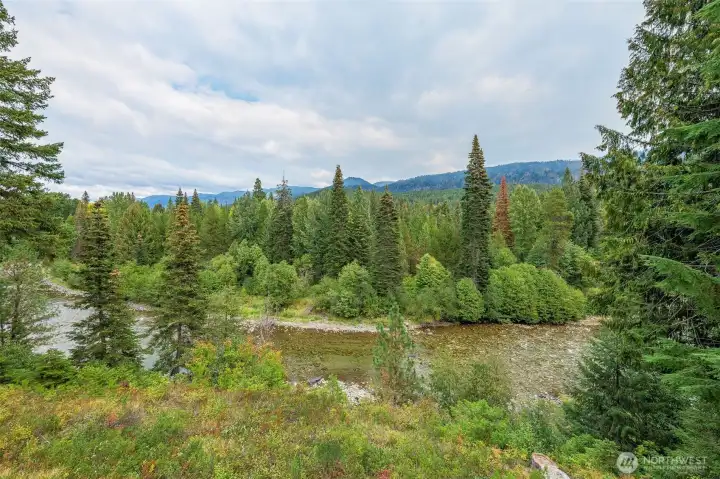 This is your view of the river. Imagine gazing at wildlife sipping water from the opposite shore...and all those hills beyond are full of snowmobile trails!