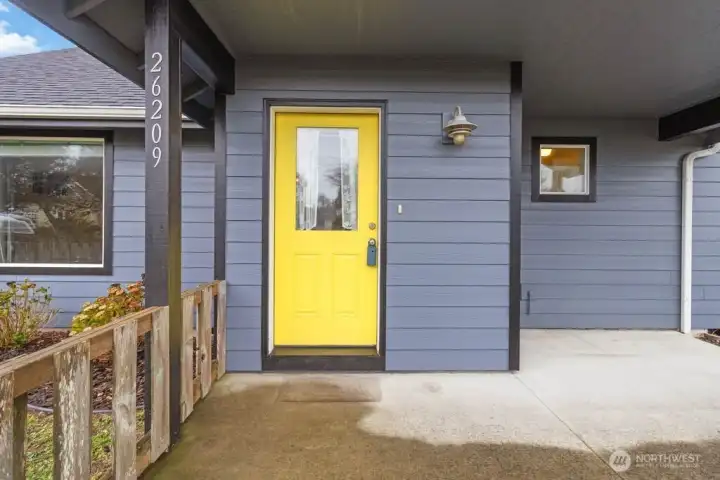 Cheery yellow door to brighten up the grayest of days!