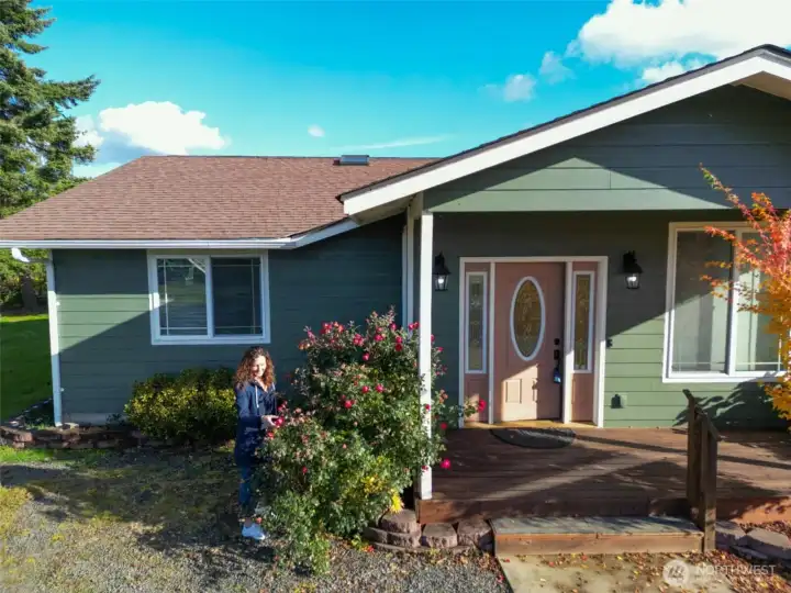 Front of home with mature landscaping