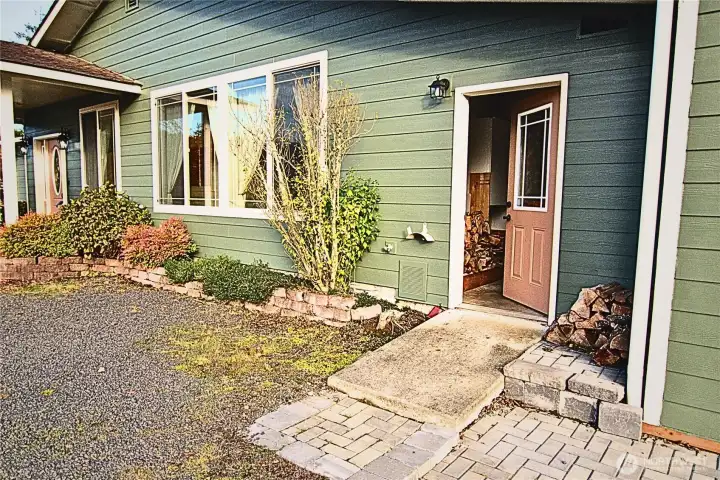 Second entry with ramp, into home, takes you into mud/laundry room.