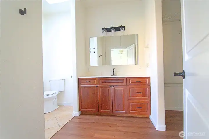 one of two primary bathrooms