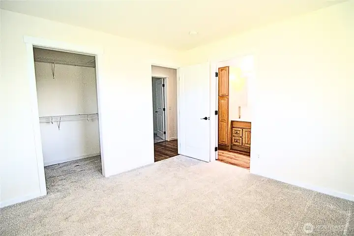 Second PRIMARY bedroom across the hall has slightly smaller bath