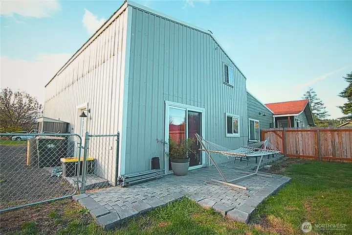 Patio slider and paver patio on the Living quarter/ADU side. Fully fenced for privacy