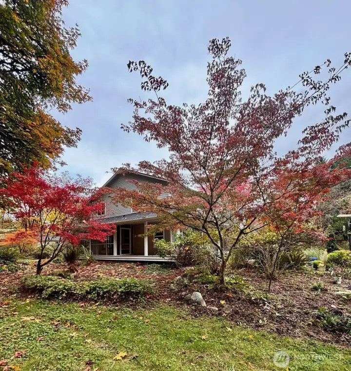 Many mature and lovely seasonal plantings and trees throughout the property.