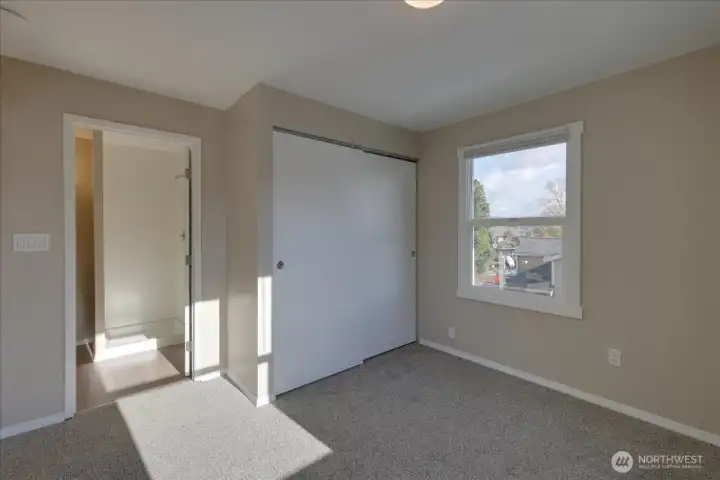 Unit #1 Bedroom looking at bath on left and don't miss the territorial views from most all units!