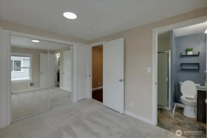 Unit #6 We added new mirrors for closet, along with extra storage doors on left and right.