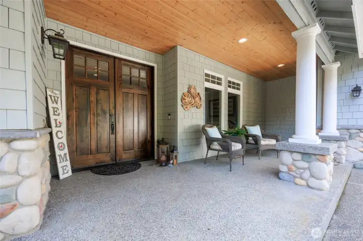 Warm and inviting covered front porch.