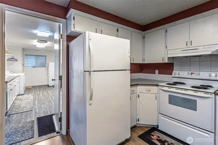 Kitchen leading to Utility room