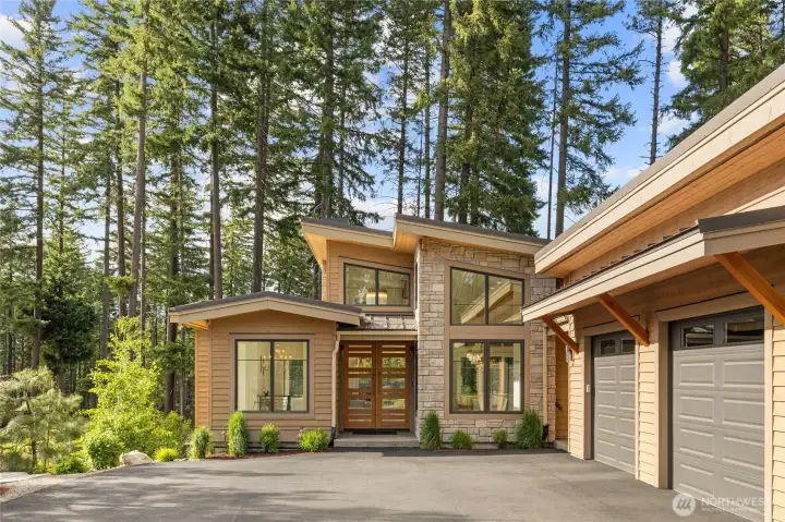 This stunning residence overlooks the 11th hole on Prospector Golf Course.