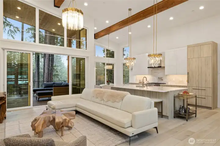 Custom chandeliers throughout the home bring elegance to everyday living. COREtec Plus luxury waterproof vinyl floors are perfect for mountain living.