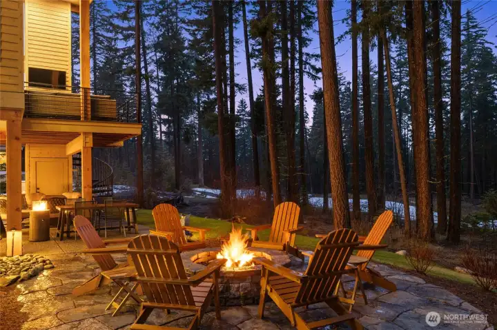 Beautiful flagstone surrounds the fire pit.