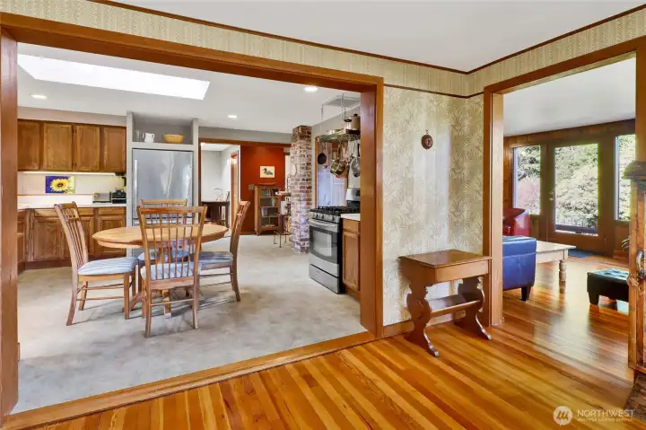 Entry view into the kitchen with an open floor plan that flows easily through the home.