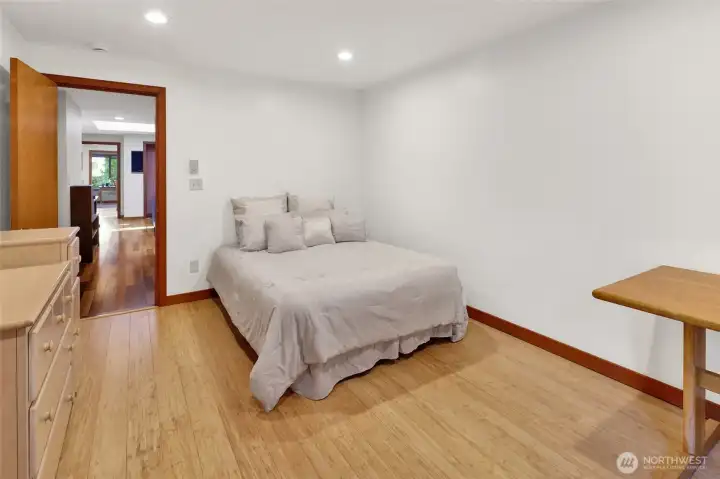 Third bedroom off the off the hallway from the office with wood floors.