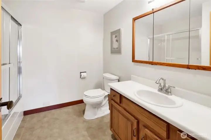 Hallway full bathroom for the remaining two bedrooms and guests.