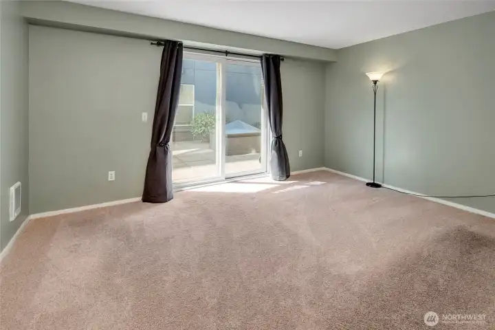 Primary bedroom with slider to the patio