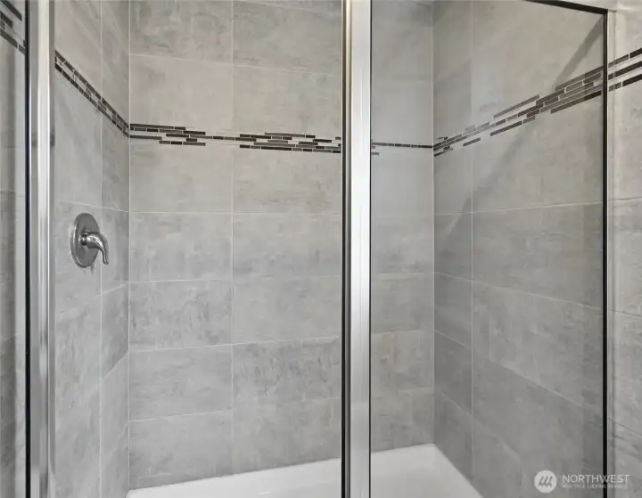 Beautifully tiled large walk in shower