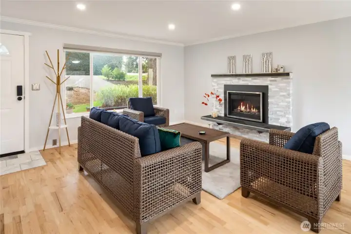 Large front window with remote operated designer blinds.