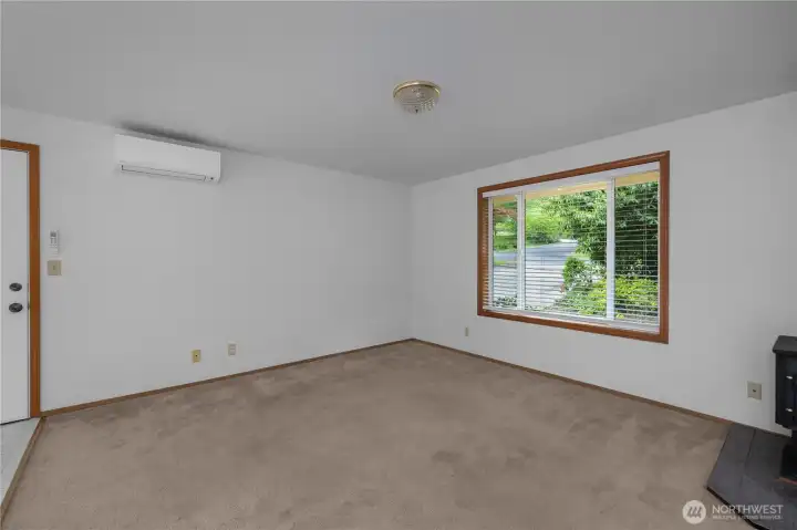 Flexible living space with mini-split comfort and great natural light.