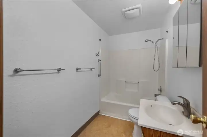 Hall Bath - Full bath with tub/shower combination and updated fixtures.