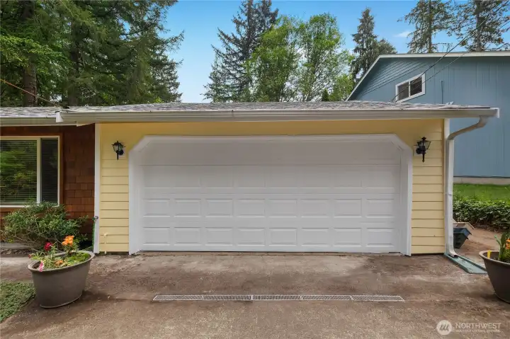 Oversized two-car garage offers great parking, storage, and hobby space.