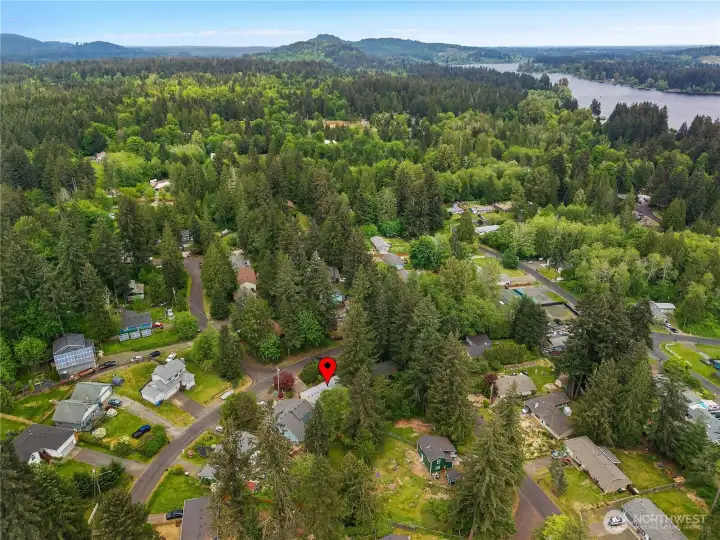 Aerial view highlights the Evergreen Shores setting near Black Lake and community amenities.