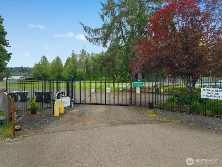 Evergreen Shores Beach Club entry with gated access to community lake amenities.