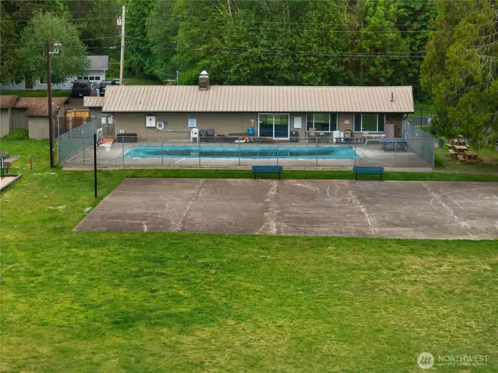 Community pool, cabana, sport court, and picnic areas included with Evergreen Shores dues.