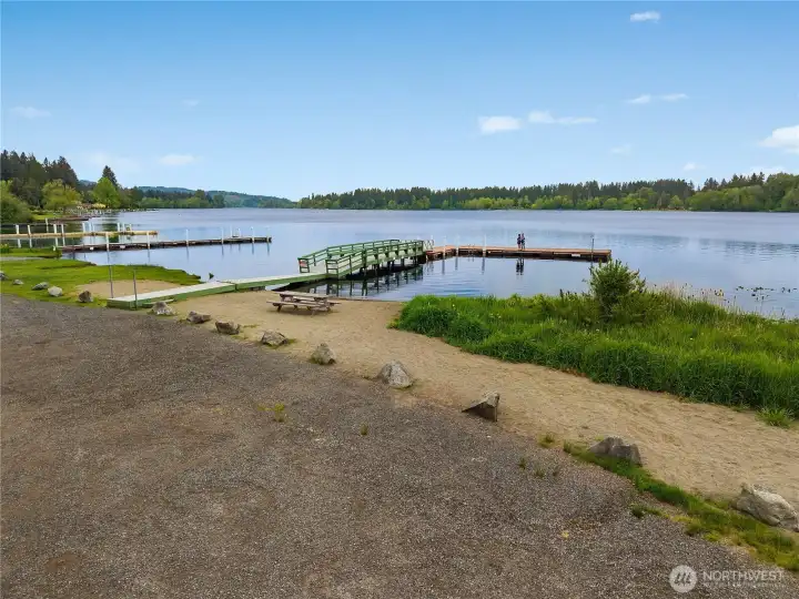 Evergreen Shores beach access includes lakefront recreation, dock, and peaceful Black Lake views.
