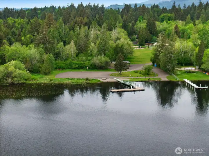 Aerial view of the community lakefront park and dock on beautiful Black Lake.
