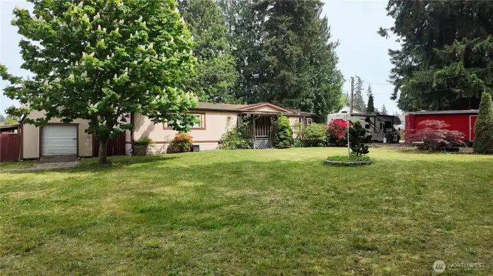 1/2 acre lot with 186 feet of frontage on Smokey Point Blvd.