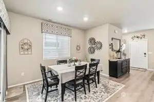 spacious dining room with slider to covered patio!