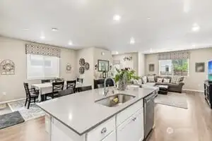 This island with seating, sink and dishwasher is incredibly efficient!