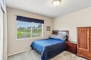 One of the other 3 bedrooms on the upper floor.