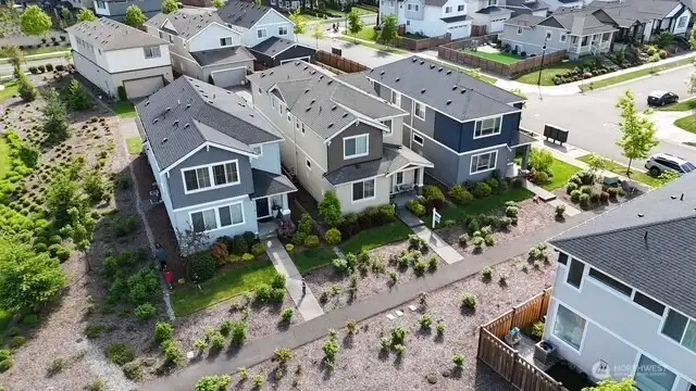 HOA maintains much of the front, but you have ample space to plant your own style!