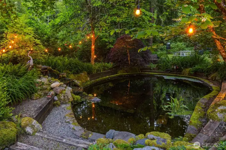 Tranquil Pond and waterfall tucked away in backyard makes for the perfect backdrop scenery