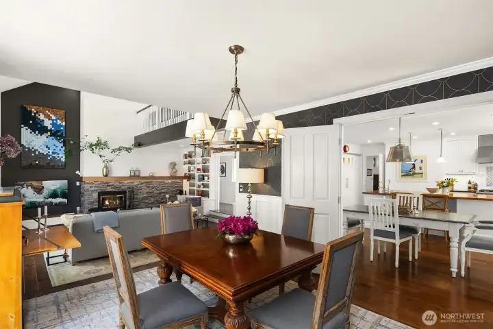 Sunken living room with fireplace and two sty ceiling