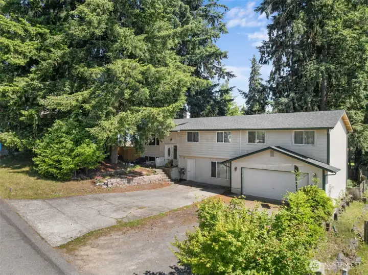 Generous lot offering an abundance of outdoor space with endless possibilities for gardening, entertaining, or future landscaping projects.