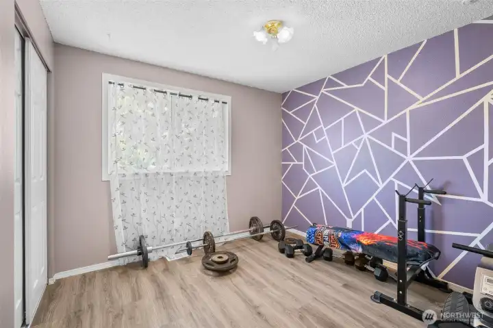 Bright upper-level third bedroom.