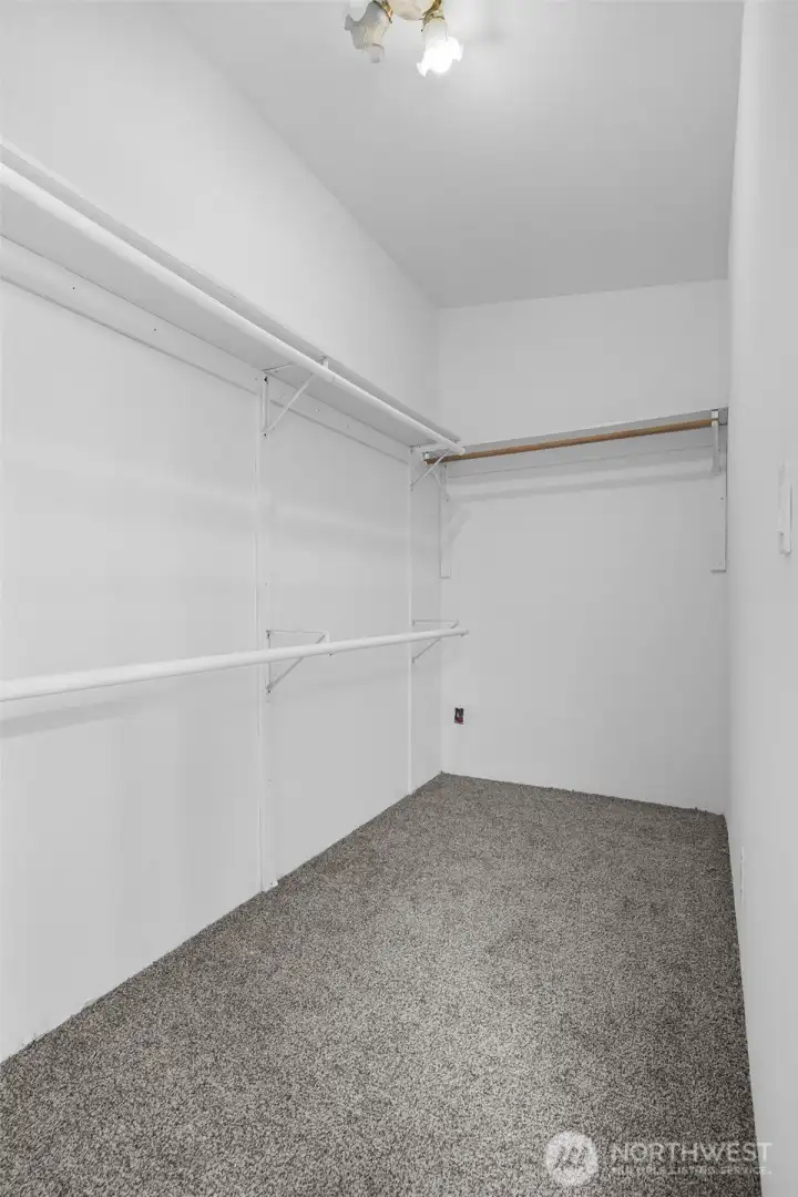 Walk-in closet, located in upper-level bonus room