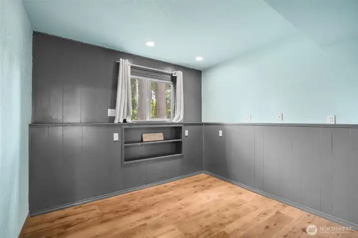 Additional versatile lower-level room located just off the bonus space—ideal for a private home office, hobby room, or extra storage.