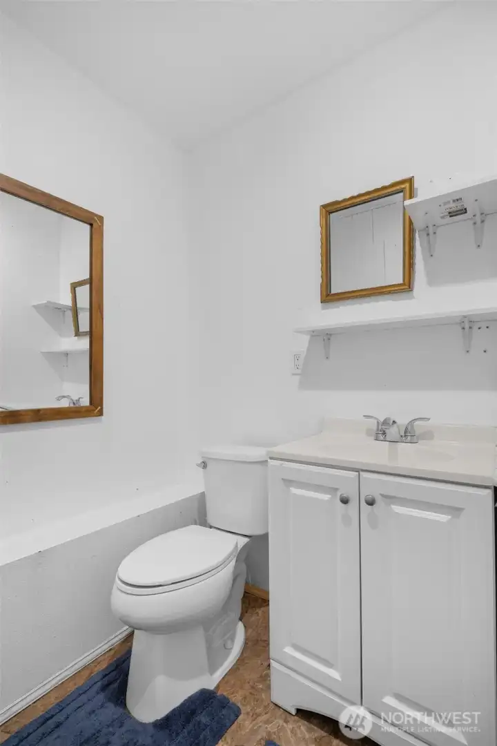 Bathroom located on lower-level off sauna room.