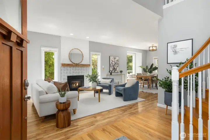 Upon entry the light is captivating in the formal dining and living space. Upon entry the light is captivating in the formal dining and living space.