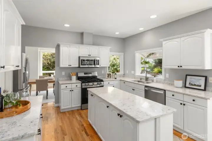 A timeless kitchen with white and grey A timeless kitchen with white and grey