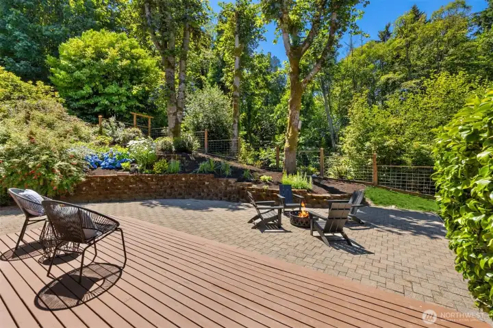The back deck and patio are bright and sunny The back deck and patio are bright and sunny